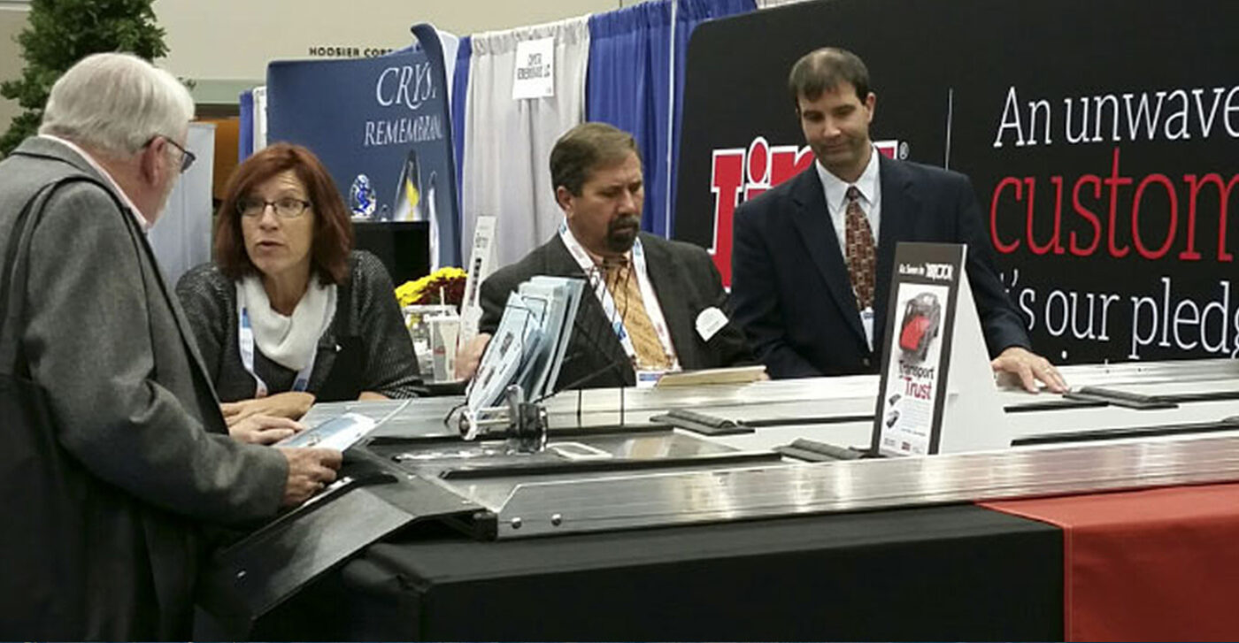 Link employees speaking to customers at 2015 NFDA