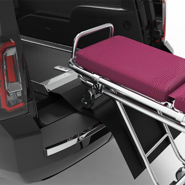 Loading a cot on HD150 Hearse Deck
