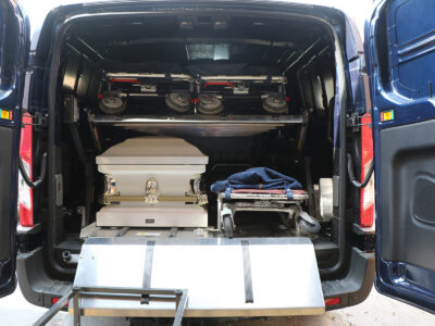DD2000-XLC loaded with 3 cots and 1 casket