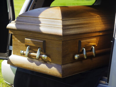 Casket on HD150 in hearse
