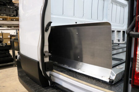 Ramp of SS150XLC folded up inside closed rear door of cargo van