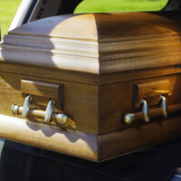 Casket on HD150 in hearse
