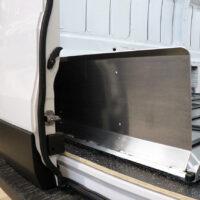 Ramp of SS150XLC folded up inside closed rear door of cargo van