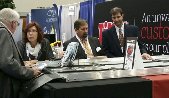 Link employees speaking to customers at 2015 NFDA