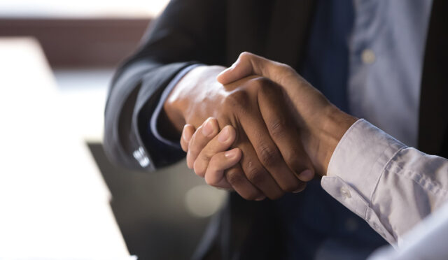 Two men shaking hands